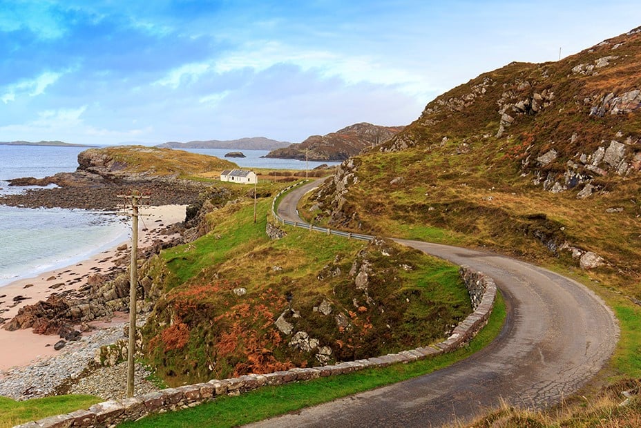 Image of coastal road representing rethinking international tourism