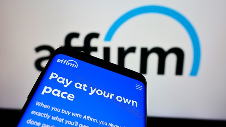 Smartphone with website of US financial technology company Affirm Holdings Inc on screen with logo